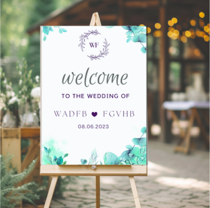 Modern watercolor wedding welcome sign with teal greenery accents on easel.