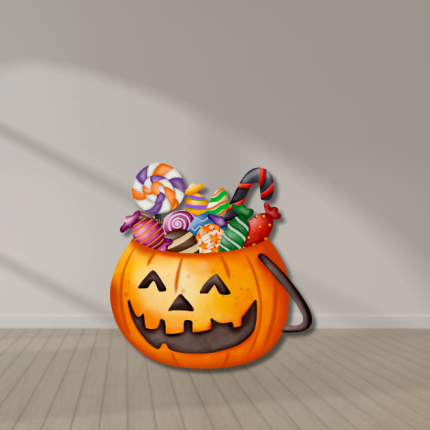 Halloween pumpkin candy bucket cutout filled with colorful treats – UV-printed foamboard decoration.