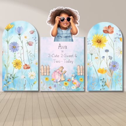 "Whimsical 2-Cute birthday backdrop with pastel floral arches, bunny illustration, and personalized panel for Ava’s second birthday party."