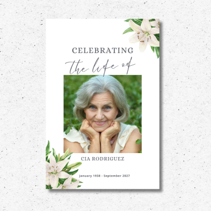Celebration of Life memorial sign with photo and floral accents, personalized with name and dates.