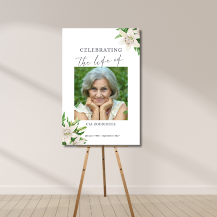 Celebration of Life memorial sign with photo and floral accents, personalized with name and dates.