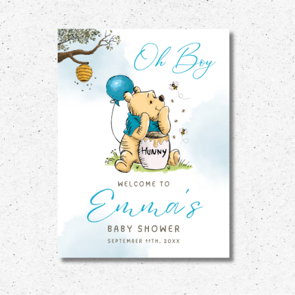 alt="Winnie the Pooh baby shower welcome sign with blue balloons and text: Oh Boy, Welcome to Emma’s Baby Shower, September 11th, 20XX"