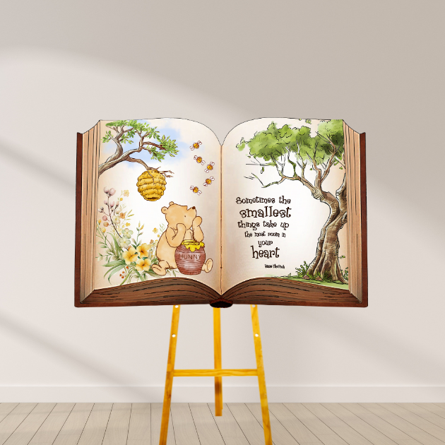 Winnie the Pooh Storybook Backdrop with Pooh holding honey pot, bees, and the quote “Sometimes the smallest things take up the most room in your heart.”