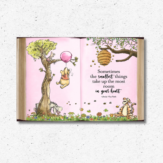 Winnie the Pooh Storybook Backdrop with Pooh holding a pink balloon, Piglet, Tigger, and Eeyore, plus the quote “Sometimes the smallest things take up the most room in your heart.”