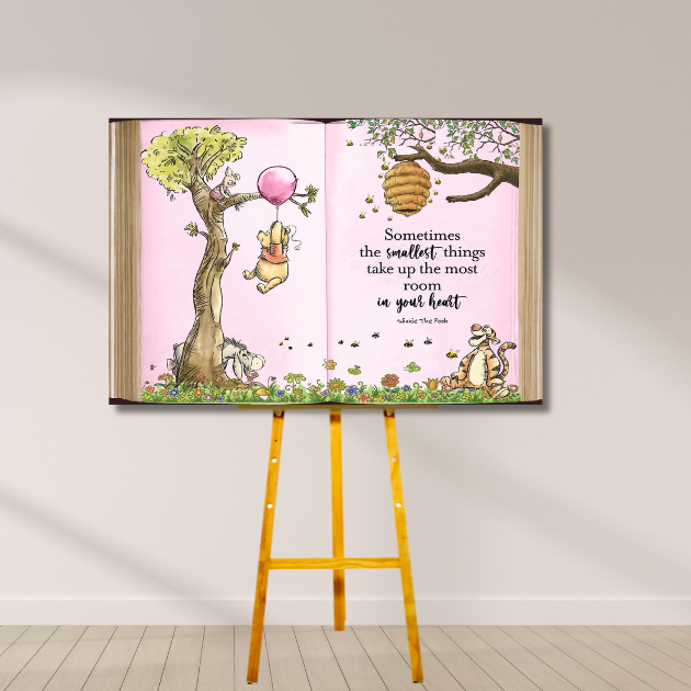 Winnie the Pooh Storybook Backdrop with Pooh holding a pink balloon, Piglet, Tigger, and Eeyore, plus the quote “Sometimes the smallest things take up the most room in your heart.”