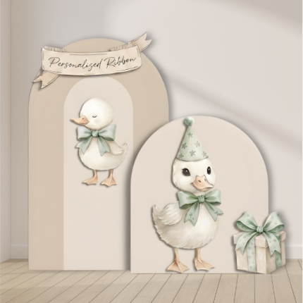 duck first birthday backdrop arch panels with duck character and personalized ribbon