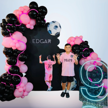 Soccer Birthday Party Backdrop with Neon Number Display and Balloon Garland