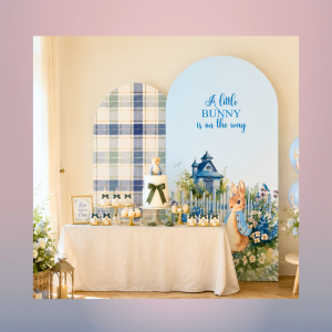 Blue storybook bunny baby shower backdrop with plaid panel and personalized baby shower design