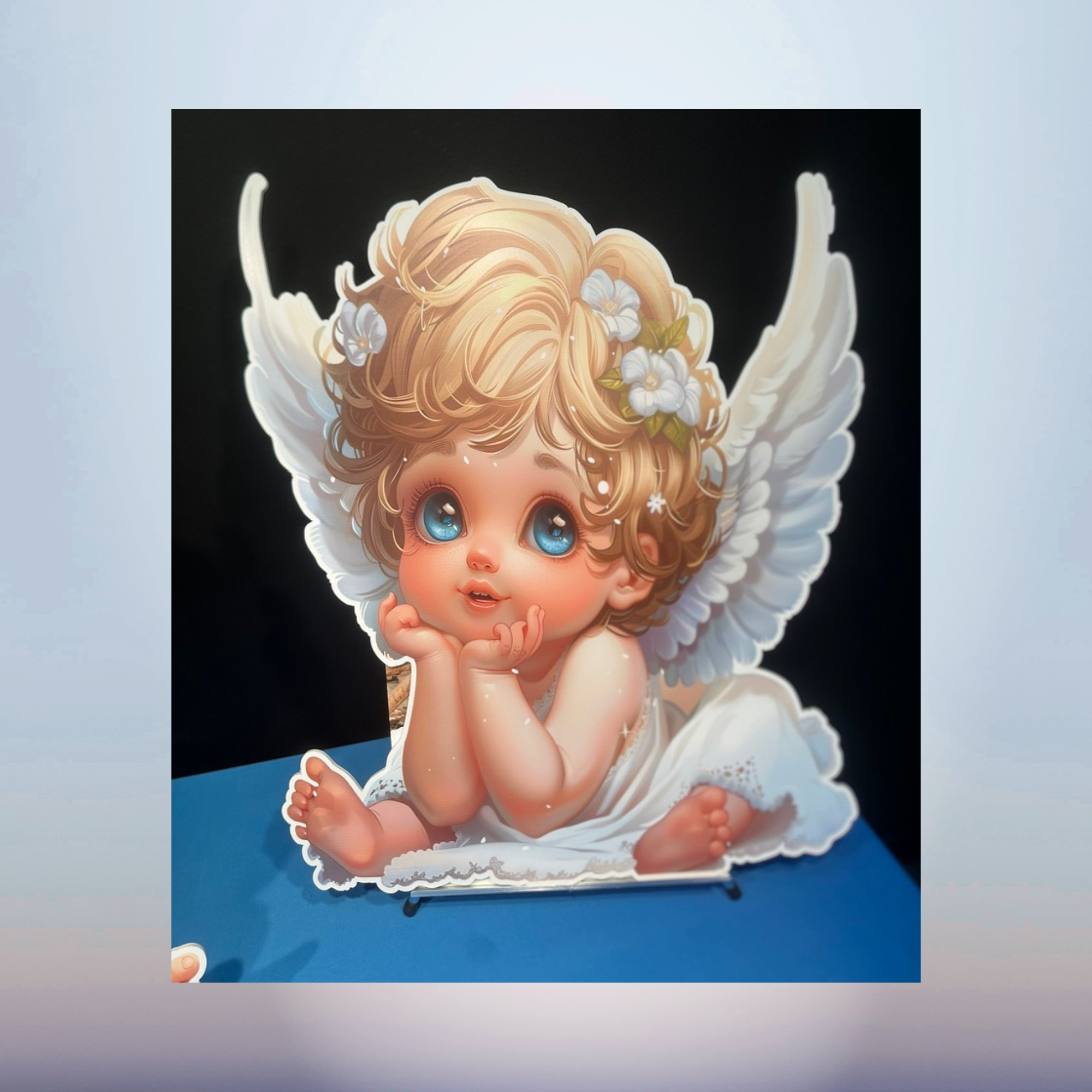 Blonde baby angel with white wings character cutout for a baby shower Title: Winged Baby Angel Cutout