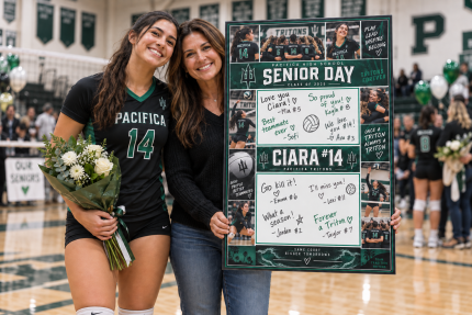 Mockup of a Pacifica volleyball senior and family member holding a green and white photo signing board.