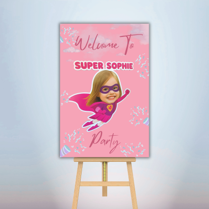 Personalized superhero birthday welcome sign with child's photo and pink superhero theme for a custom kids birthday party.